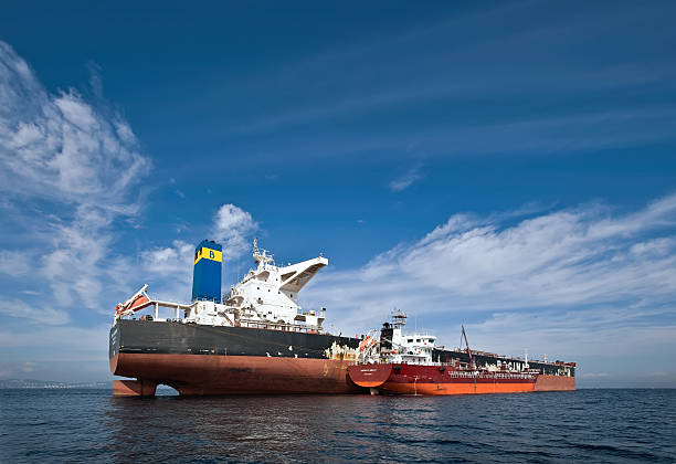 istockphoto-502789384-612x612 Nakhodka, Russia - September 17, 2015: Bunkering tanker Gazpromneft Zuid East bulk carrier FMG Cloudbreak. Port Nakhodka- one of the main ports in the Russian Far East bunkering.